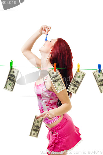 Image of Shocked woman with cash wash money