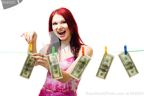 Image of Shocked woman with cash wash money