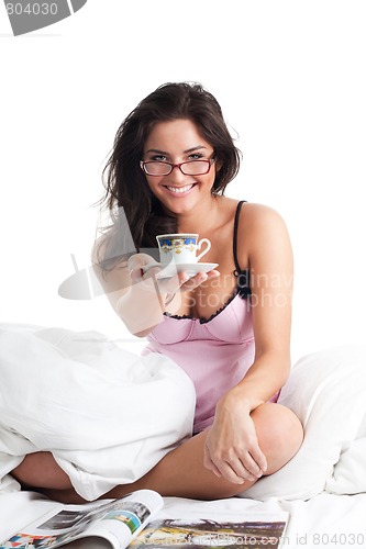 Image of Woman smile and give cup of coffee