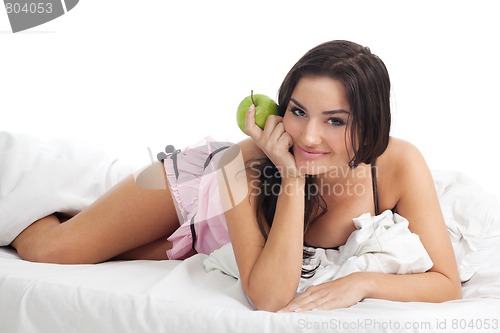 Image of Seductive woman with apple