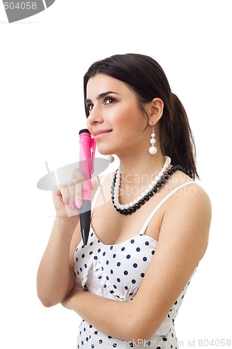 Image of Beautiful woman thinking holding pen