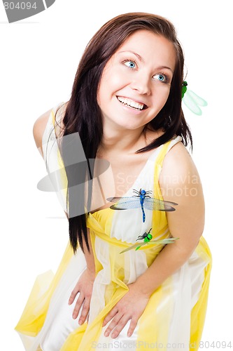 Image of Woman in light dress with dragonflies on it