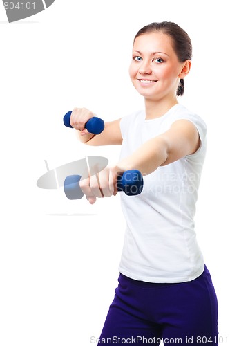 Image of woman exercises with dumbbells