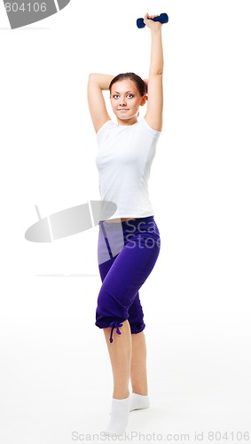 Image of Trainer show exercise with dumbbell