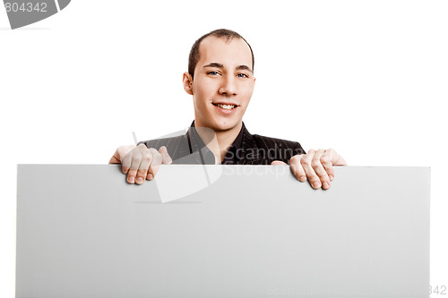 Image of Businessman showing something