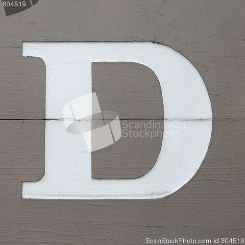 Image of Letter D on wooden board