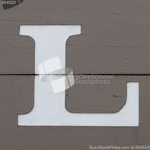 Image of Letter L on wooden board