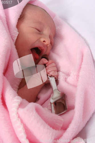 Image of Baby born with silver spoon in her mouth