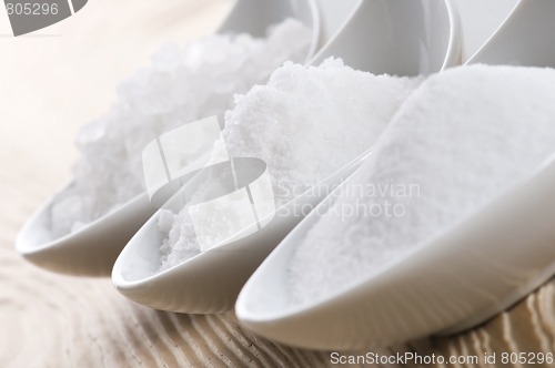 Image of three spoons with difrent salt