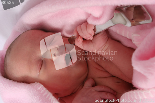 Image of Baby born with silver spoon in her mouth