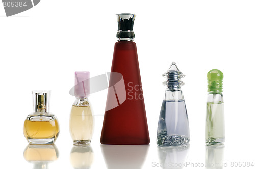 Image of Multi-coloured bottles with perfumery