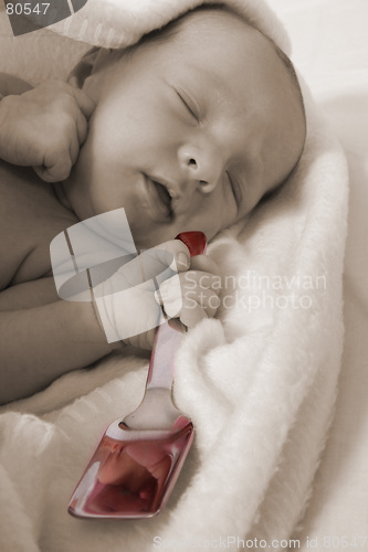 Image of Baby born with silver spoon in her mouth