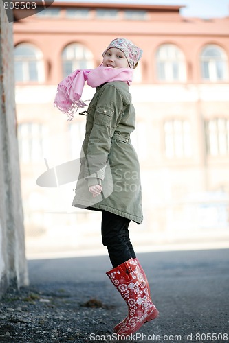 Image of Beautiful teenage girl jumping outdoors