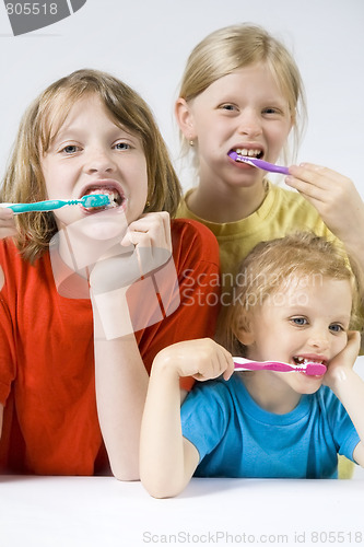 Image of Children brushing teeth