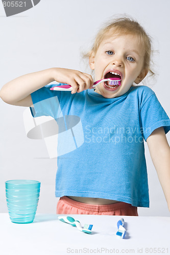 Image of Children brushing teeth