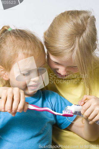 Image of Children brushing teeth