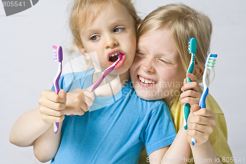 Image of Children brushing teeth
