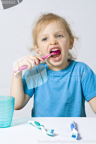 Image of Children brushing teeth