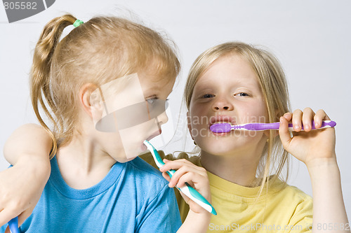 Image of Children brushing teeth