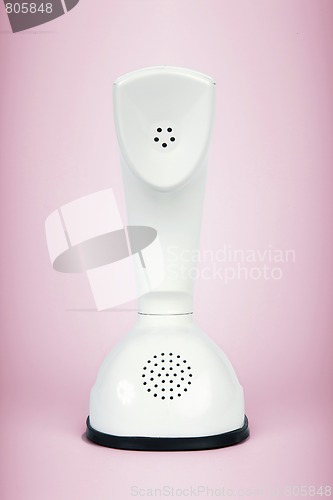 Image of Retro telephone isolated on pink