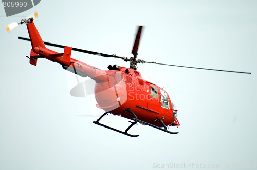 Image of red helicopter