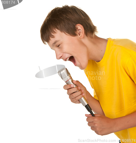 Image of boy with microphone on white