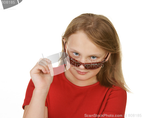 Image of young girl wearing sunglasses