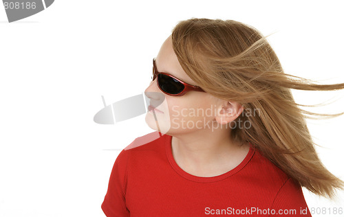 Image of young girl wearing sunglasses