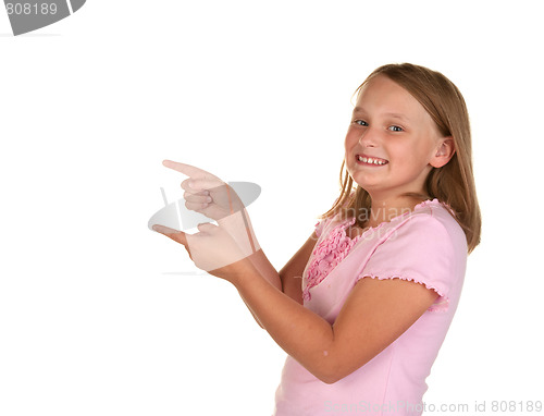 Image of young girl pointing on white