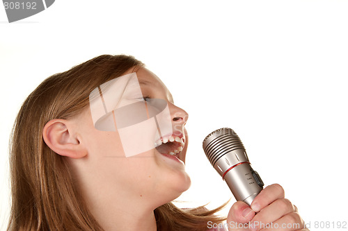 Image of young girl singing karaoke on white