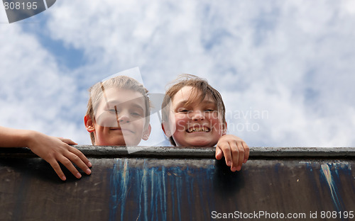 Image of brother and sister on wall