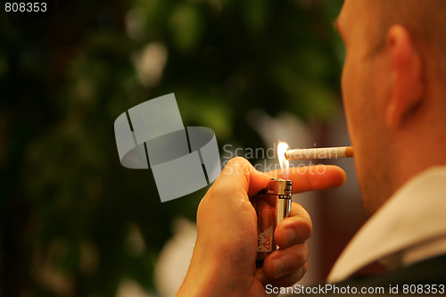 Image of Lighting a cigarette