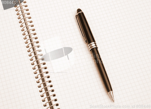 Image of The notebook and pen