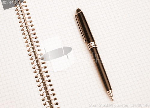 Image of The notebook and pen