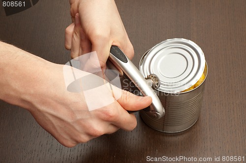 Image of Process of opening the can