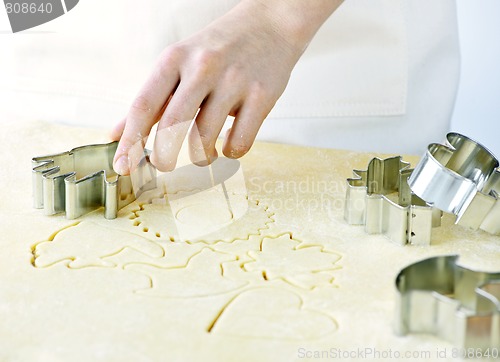 Image of Cookie cutter and dough