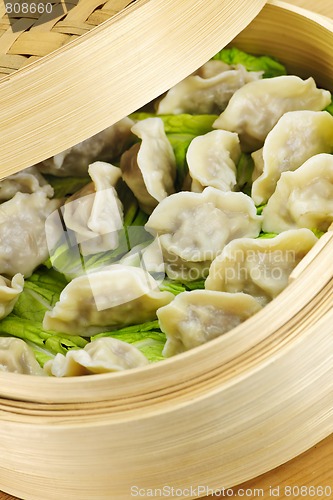 Image of Bamboo steamer with dumplings