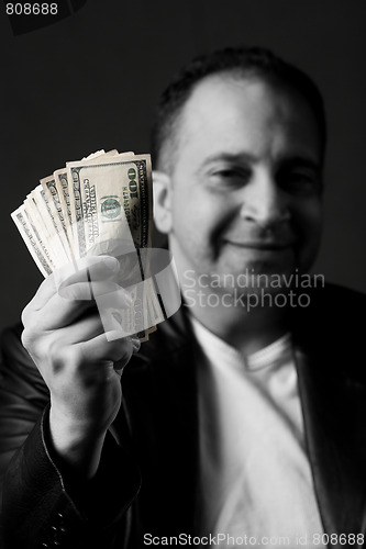 Image of Man Holding Money