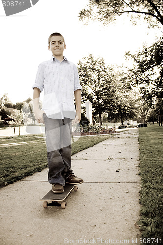 Image of Boy On His Skateboard