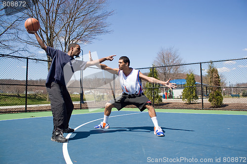 Image of Men Playing Basketball