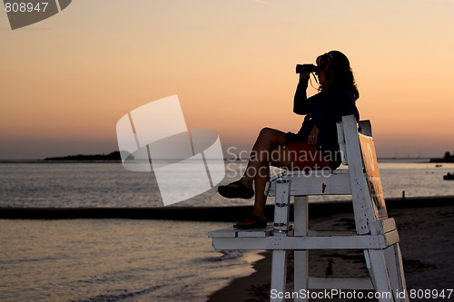 Image of Woman With Binoculars