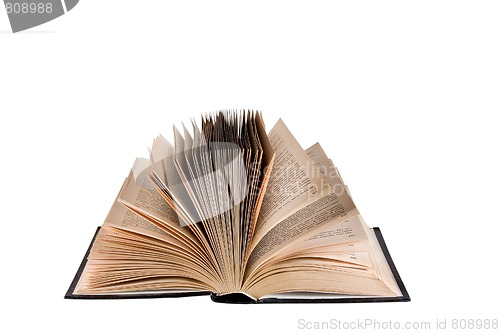 Image of opened old book isolated in white