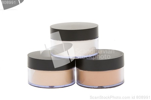 Image of cosmetic jars with powder isolated in white