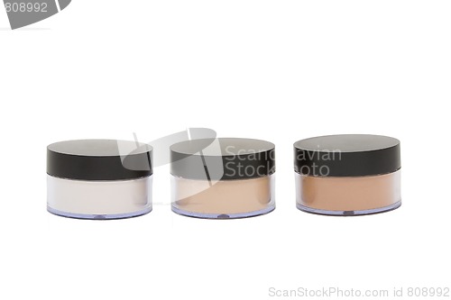 Image of cosmetic jars with powder isoleted in white