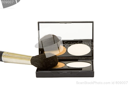 Image of make-up box with powder and brush isolated in white