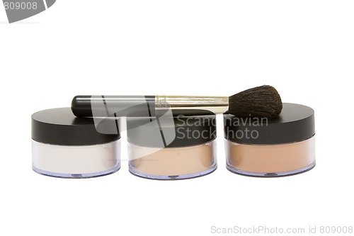 Image of Make-up powder jars with brush isolated