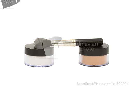 Image of Make-up powder jars with brush isolated