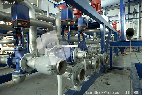 Image of Equipment, cables and piping as found inside of a modern industr