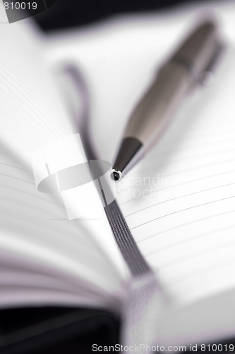 Image of Notebook and pen