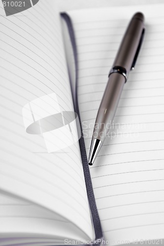 Image of Pen and notebook